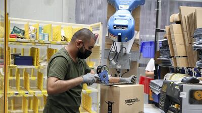 A completed order is boxed and sealed for delivery, but still does not have an address label - that comes at the Slam station. Pawan Singh / The National