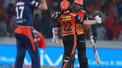 Sunrisers Hyderabad players Yusuf Pathan, right, and Kane Williamson celebrate their comprehensive win over Delhi Daredevils on Saturday. Mahesh Kumar A / AP Photo
