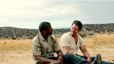 Denzel Washington, left, and Mark Wahlberg as the bank-robbing double agents in 2 Guns. AP Photo / Universal Pictures, Patti Perret