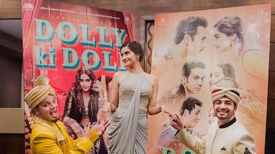 A handout photo of Sonam Kapoor (center) with RJ Vikrant (left) and RJ Mohit of Radio Mirchi's Mirchi Mornings - Morning Drive Time for the promotion of Dolly Ki Doli (Photo by Joseph Radhik for Radio Mirchi)