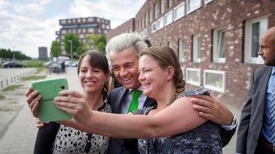Mr Wilders with supporters in The Hague in 2014. AP