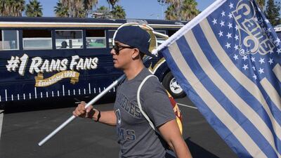 Los Angeles Rams fan with a flag before the game against the Seattle Seahawks. Kirby Lee / USA Today Sports