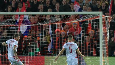 Sivakov, left, and Belarus' Denis Polyakov fail to stop a shot as Netherlands' Memphis Depay scores the opening goal. AP Photo