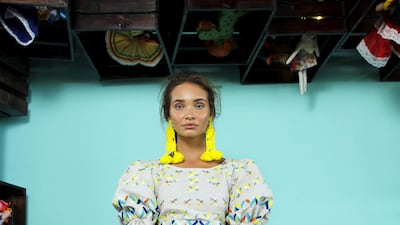 Exaggerated balloon-sleeves feature heavily on embroidered blouses