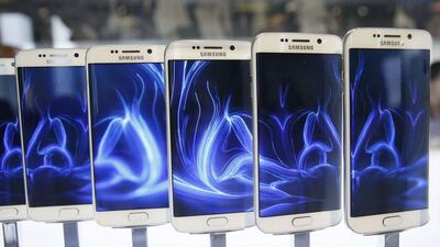 A row of Galaxy S6 edge smartphones are seen on display after the Samsung Galaxy Unpacked event. New features include Samsung Pay. Albert Gea / Reuters