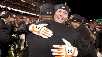 Tim Hudson #17 of the San Francisco Giants smiles after the Giants defeat the St. Louis Cardinals 6-3 during Game Five of the National League Championship Series at AT&T Park on October 16, 2014 in San Francisco, California. Christian Petersen/Getty Images