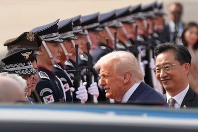 President Donald Trump on his way to board Air Force One at Gimhae International Airport in Busan, South Korea. AP
