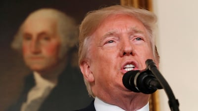 Donald Trump speaks about Iran and the Iran nuclear deal in front of a portrait of George Washington on Friday. Kevin Lamarque / Reuters