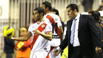 Rayo Vallecano's coach Jose Ramon Sandoval, right, has ensured his side have kept their feet on the ground this season following promotion.