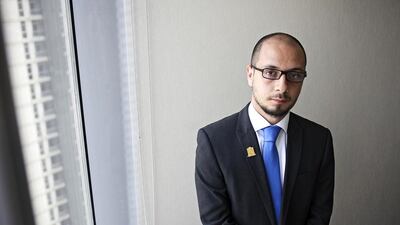 Karam Aldabbagh, an equity trader at Al Ramz Securities in Abu Dhabi, says First Gulf Bank and Air Arabia are top investments for dividend yield. Lee Hoagland / The National