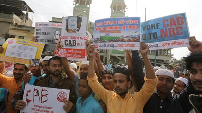 Indian Muslims protest against the Citizenship Amendment Bill after Friday prayers in Ahmadabad on December 13, 2019. AP Photo