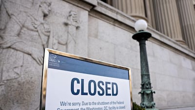 A sign announces the closure of the National Archives in Washington because of the partial US government shutdown. Bloomberg