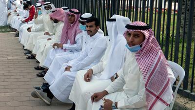 Demonstrators gather in front of Kuwait National Assembly building. REUTERS