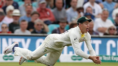 Marnus Labuschagne takes a diving catch to dismiss Jos Buttler. Getty