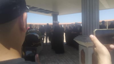 Druze clerics pray in front of assassinated militia leader Morhej Al Jaramani's body during his funeral in the village of Umm Al Zaytun, in Syria's Suweida province on July 18. All photos: Suhail Theiban