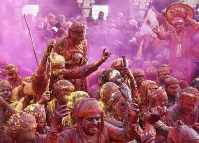 The Lathmar Holi festival near Mathura, India. Ajay Aggarwal / Hindustan Times via Getty Images