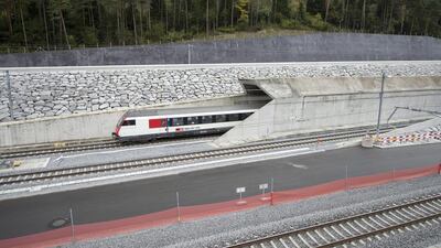 A test train close to the northern gate near Erstfeld, Switzerland, in October last year. The opening celebrations of the Switzerland’s the largest-ever construction project will start on June 1. Urs Flueeler / EPA
