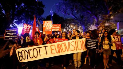 Protesters hold banners and placards as they take part in a demonstration calling for an end to Israel's policy towards Gaza and a boycott of the 2019 Eurovision Song Contest as the first semi final of the contest begins in Tel Aviv, Israel May 14, 2019. Reuters