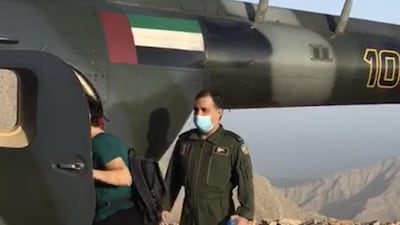 A woman is rescued by Ras Al Khaimah Police's air wing team after getting lost while hiking in Wadi Ghalilah. Courtesy: RAK Police