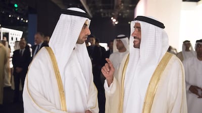 HH Sheikh Nahyan Bin Zayed Al Nahyan, Chairman of the Board of Trustees of Zayed bin Sultan Al Nahyan Charitable and Humanitarian Foundation, right, speaks with HH Sheikh Khaled bin Zayed al Nahyan, Deputy Chairman of Etihad Airways, left, during a tour of the Moroccan Heritage Week exhibition at the Abu Dhabi National Exhibition Centre (ADNEC). Mohamed Al Suwaidi / Crown Prince Court - Abu Dhabi