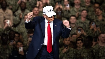 Mr Trump dancing after delivering a speech on board the US Navy's USS George Washington in Yokosuka. Earlier in his Asia tour, he also danced in Malaysia. AFP