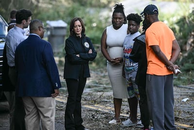 US Vice President Kamala Harris speaks with community members as she surveys the damage from Hurricane Helene in Augusta, Georgia. AFP