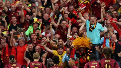 Belgium's Youri Tielemans celebrates scoring their first goal with teammates. Reuters