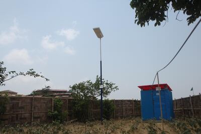A solar-powered lamppost lights the way for refugees in Cox’s Bazar, Bangladesh. Courtesy Electricians Without Borders