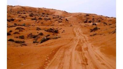 A sand track in the desert on the way to Al Hamra. Paolo Rossetti for The National