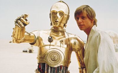 C3PO with Luke Skywalker, played by Mark Hamill. AP