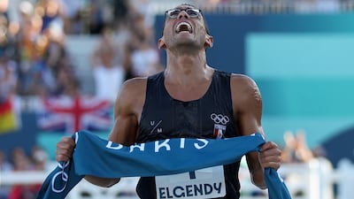 Ahmed Elgendy of Egypt crosses the finish line during the laser run. Getty Images