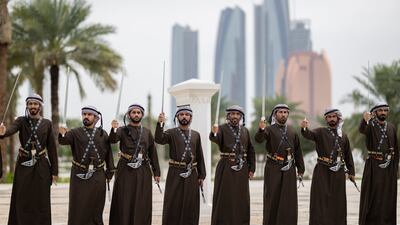 Emiratis perform a traditional dance during the state visit. Mohamed Al Blooshi for the UAE Presidential Court