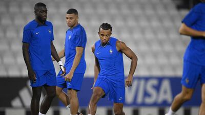 Jules Kounde takes part in a France training session at Al Janoub Stadium. AFP