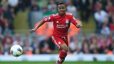 LIVERPOOL, ENGLAND - MARCH 24: Raheem Sterling of Liverpool in action during the Barclays Premier League match between Liverpool and Wigan Athletic at Anfield on March 24, 2012 in Liverpool, England. (Photo by Laurence Griffiths/Getty Images) *** Local Caption *** Raheem Sterling