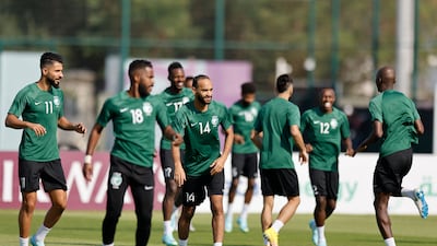 Saudi Arabia midfielder Abdullah Otayf, centre, and teammates take part in a training session for their World Cup opener against Argentina. AFP