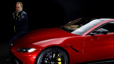 Andy Palmer, CEO of Aston Martin, with the company's Vantage. Reuters