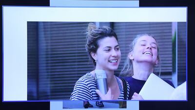 A photograph appears on a monitor as evidence. AFP