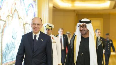 Abu Dhabi’s Crown Prince, right, walking with the Prime Minister of Italy, Enrico Letta, left, after a meeting at Emirates Palace. Ryan Carter / Crown Prince Court - Abu Dhabi
