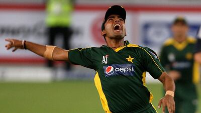 Umar Akmal celebrating the wicket of Paul Collingwood in the first T20 cricket match against England in Dubai on February 29, 2010. Pawan Singh / The National