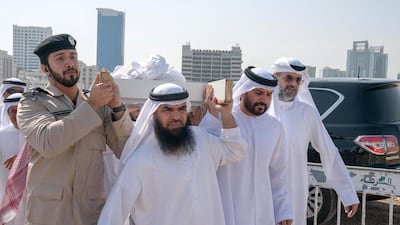 The body of Sheikh Khalid is carried into King Faisal Mosque by Sheikh Sultan bin Muhammad, Crown Prince of Sharjah, on Wednesday. Wam
