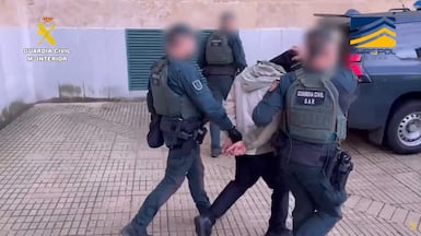 Spanish Civil Guard officers arresting a person suspected of terrorism offences. Photo: Guardia Civil