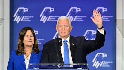 Former US vice president and Republican presidential candidate Mike Pence, with his wife Karen, acknowledges the crowd at the Republican Jewish Coalition (RJC) Annual Leadership Summit. AFP