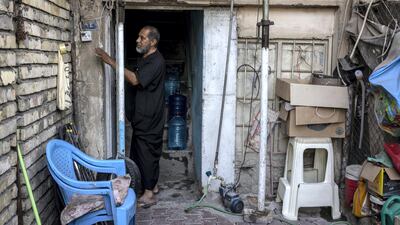 Habib Abbas Alsaadi at the entrance to the family's house. Haider Husseini for The National