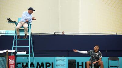Nick Kyrgios complains to umpire Fergus Murphy during his first round match against Roberto Carballes Baena. Alex Pantling / Getty Images