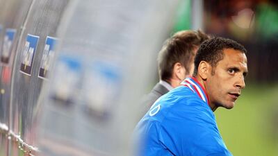 Rio Ferdinand shown on the bench during the 2010 World Cup with England. Paul Gilham / Getty Images / June 21, 2010