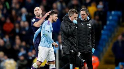 Manchester City's David Silva leaves the pitch with a suspected injury. PA