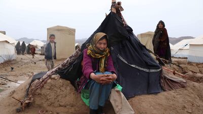 An Afghan girl at her temporary shelter provided by the United Nations High Commissioner for Refugees. There are now more than 70 million people displaced in the world. Jalil Rezayee / EPA