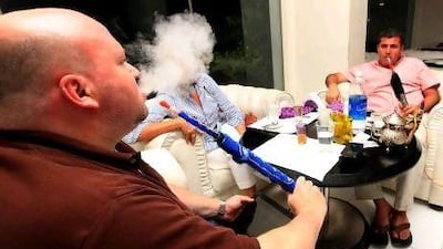 People enjoying Sheesha at the Lounge Wish in Dubai, venues such as this will now have to display signs warning about passive smoking.