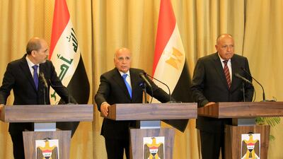 Iraqi Foreign Minister Fuad Hussein, centre, Egyptian Foreign Minister Sameh Shoukry, right, and Jordanian Foreign Minister Ayman Safadi at a press conference in Baghdad. EPA