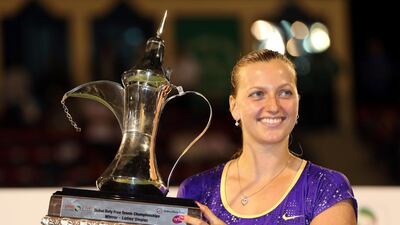 Petra Kvitova of Czech Republic holds the trophy after defeating Sara Errani of Italy in the final of last year's Dubai Duty Free Tennis Championship. Julian Finney / Getty Images